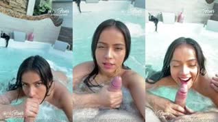 Aida Cortes chupando la verga de un millonario en la piscina