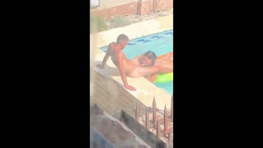 young woman sucking her boss cock in the pool